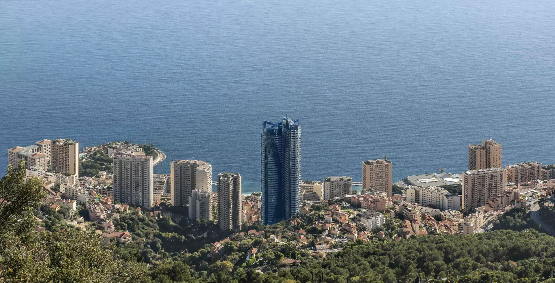 Aerial view of La Rousse – Saint Roman with modern high-rises and sea backdrop in Monaco.